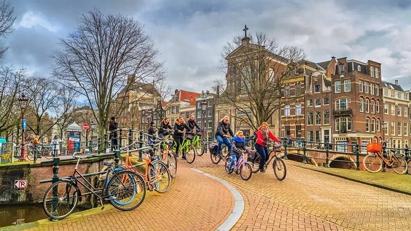 Family cycling in Amsterdam