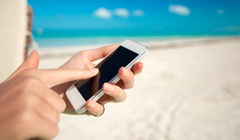 Cell phone working on the beach